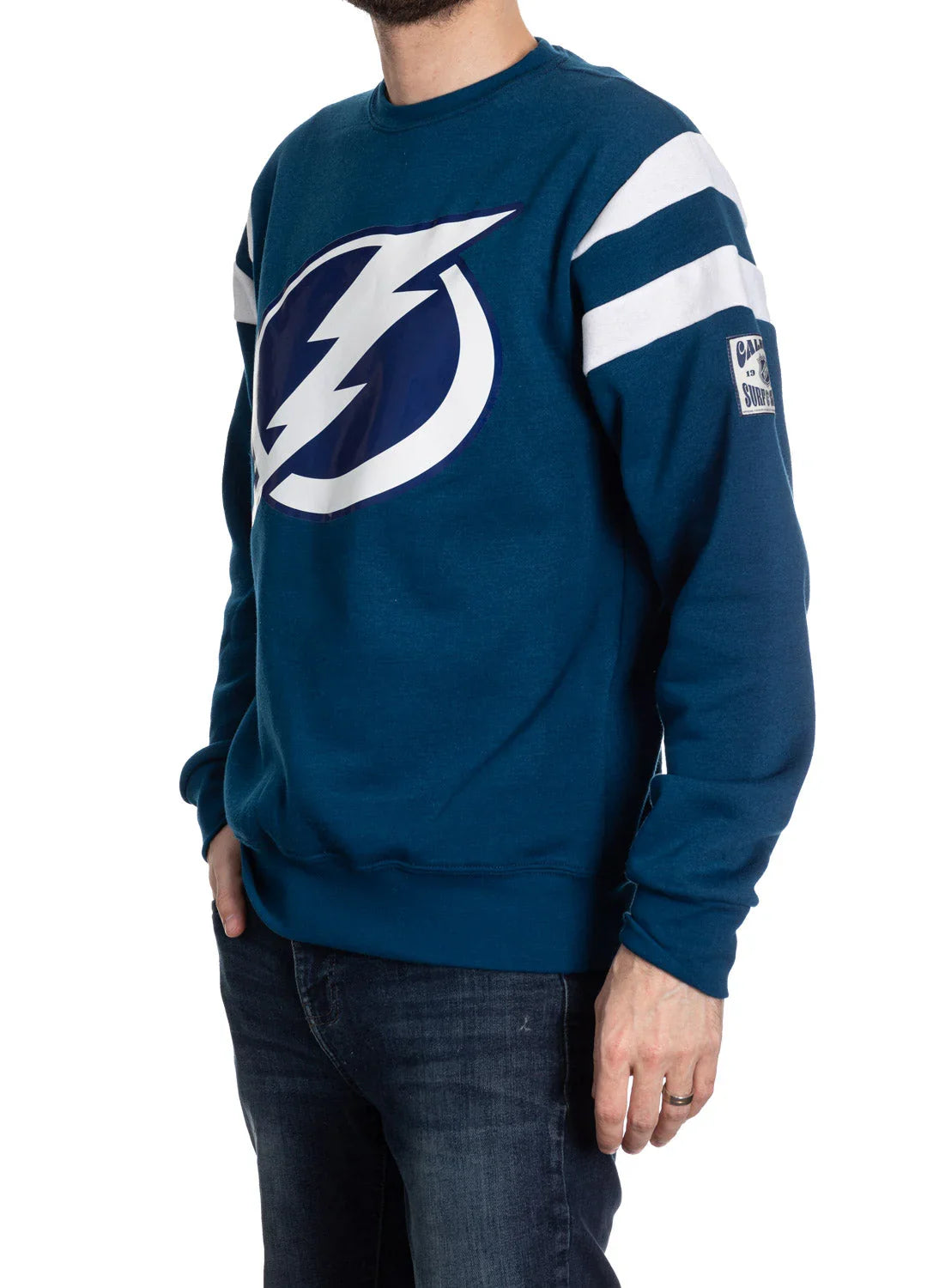 Man wearing blue Tampa Bay Lightning sweatshirt with white stripes and bold logo