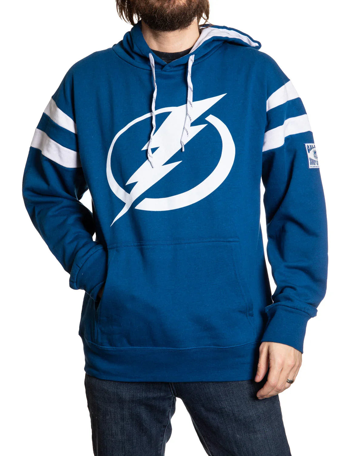 Man wearing blue Tampa Bay Lightning varsity hoodie with white stripes on sleeves