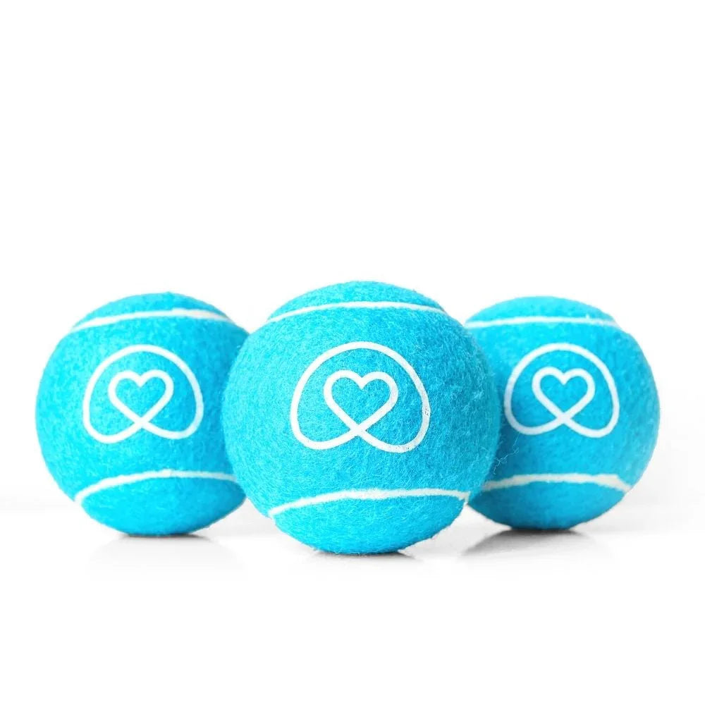 Three blue tennis balls with white heart logo on white background
