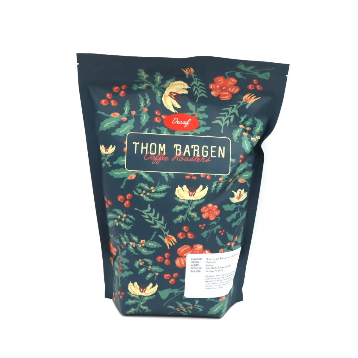 Thom Bargen decaf coffee bag with floral design on a dark background