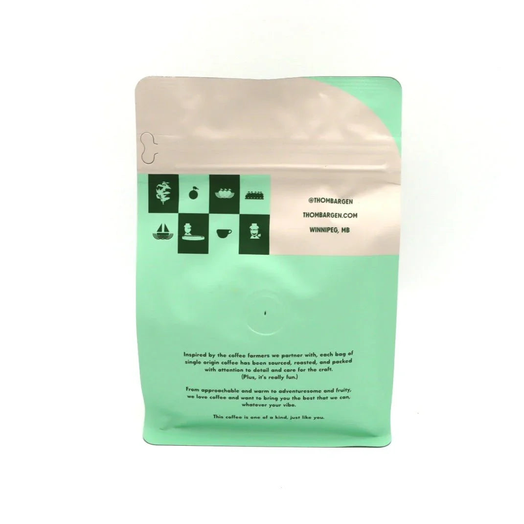 Thom Bargen coffee bag mint green with icons and Winnipeg contact details on white background