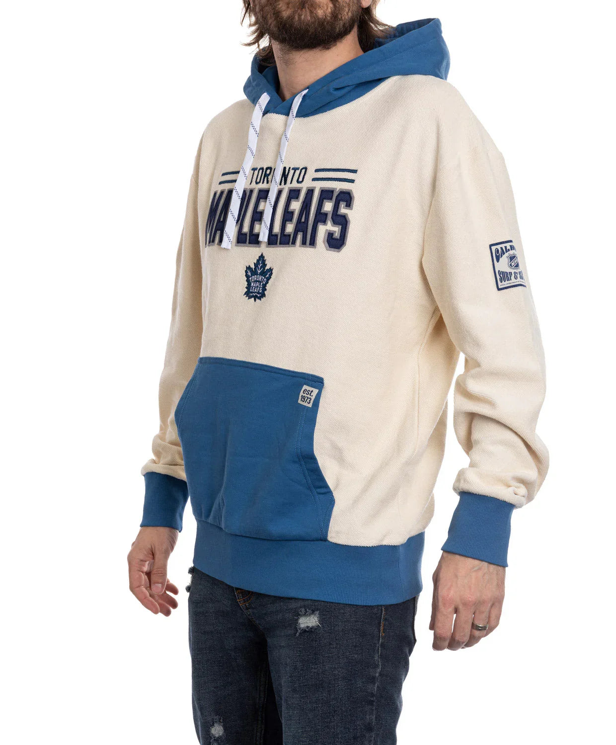 Toronto Maple Leafs hoodie with blue hood and pocket, worn by a man in jeans.