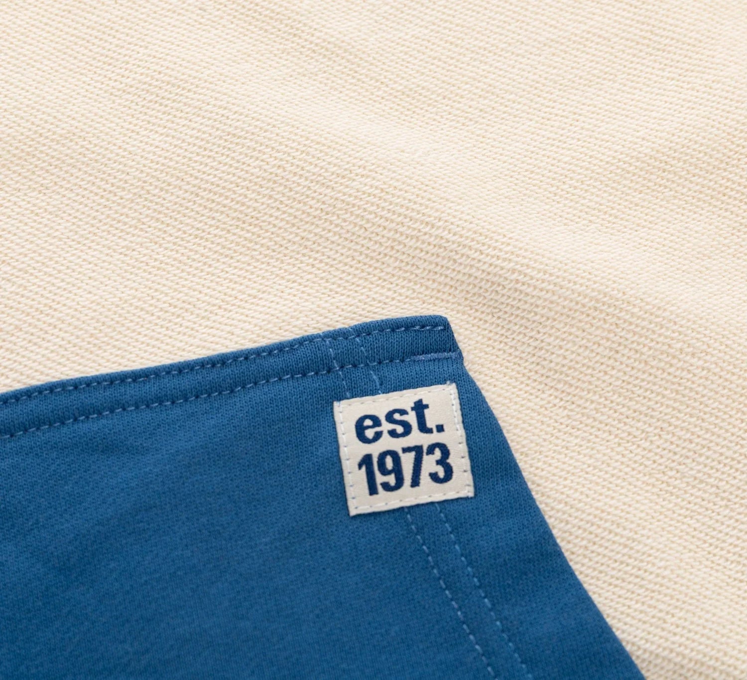 Toronto Maple Leafs hoodie detail with blue fabric and est. 1973 patch
