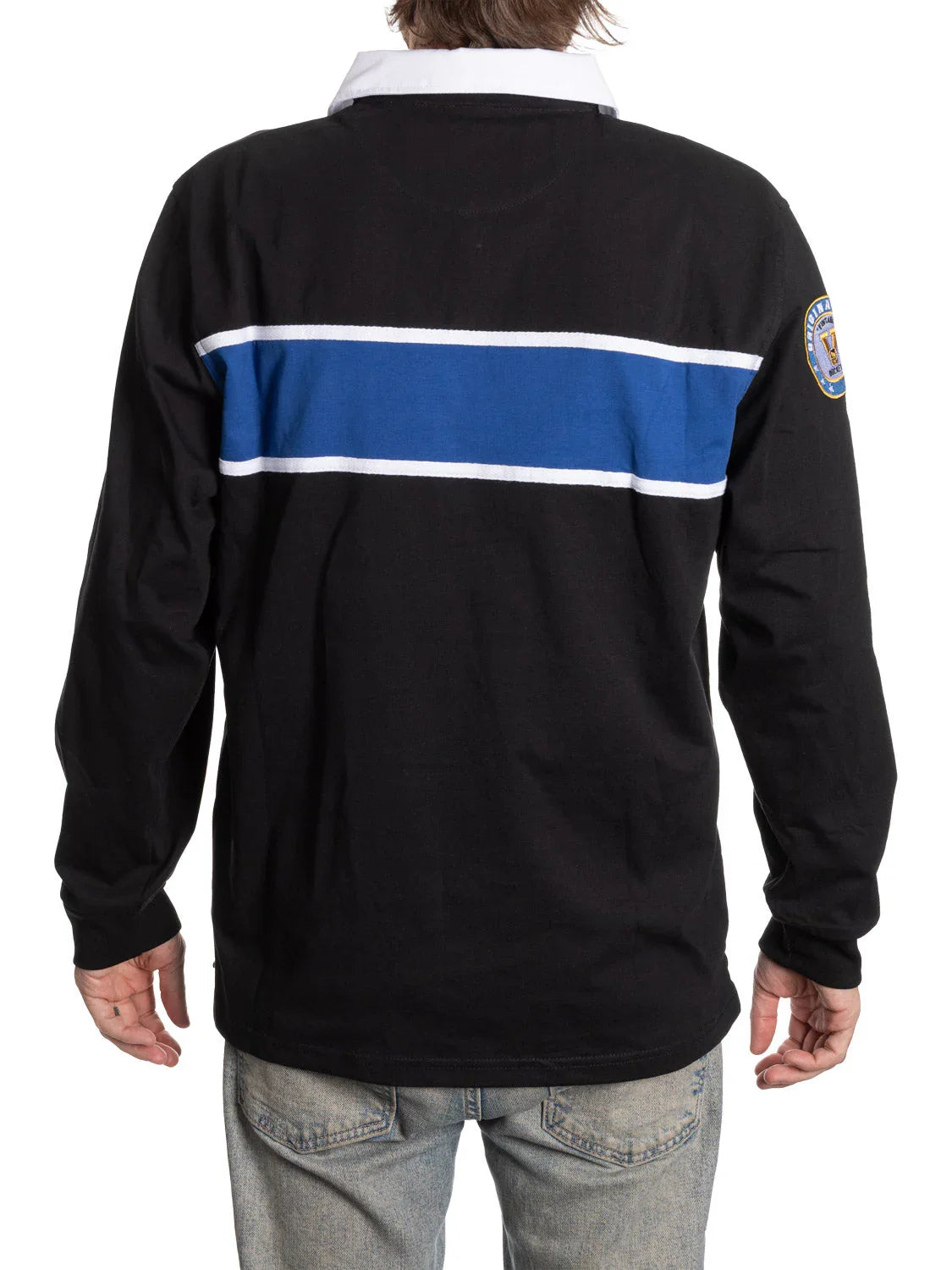 Back view of a black rugby shirt with blue and white stripe and patch on sleeve
