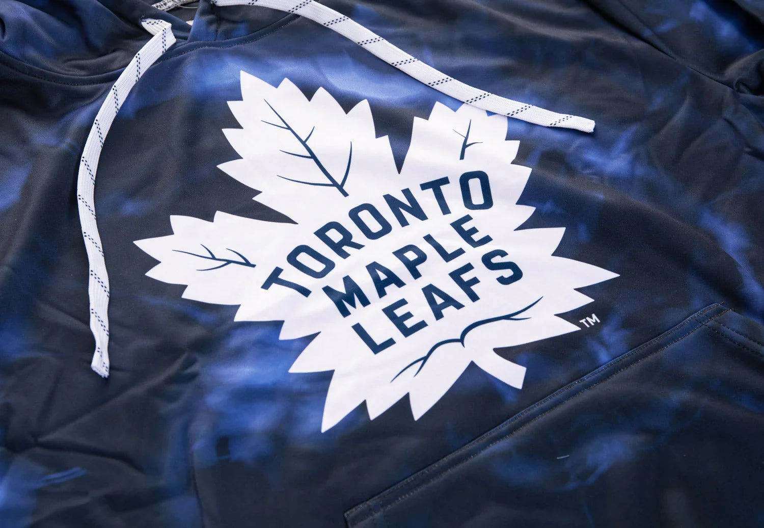 Toronto Maple Leafs hoodie with white leaf logo on blue sublimated fabric