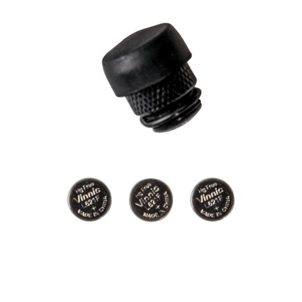 Trophy Ridge archery click light with three button cell batteries on a plain background