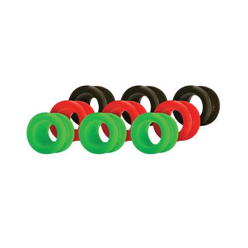 Assorted green, red, and black rubber inserts for TG75X dart flights on white background