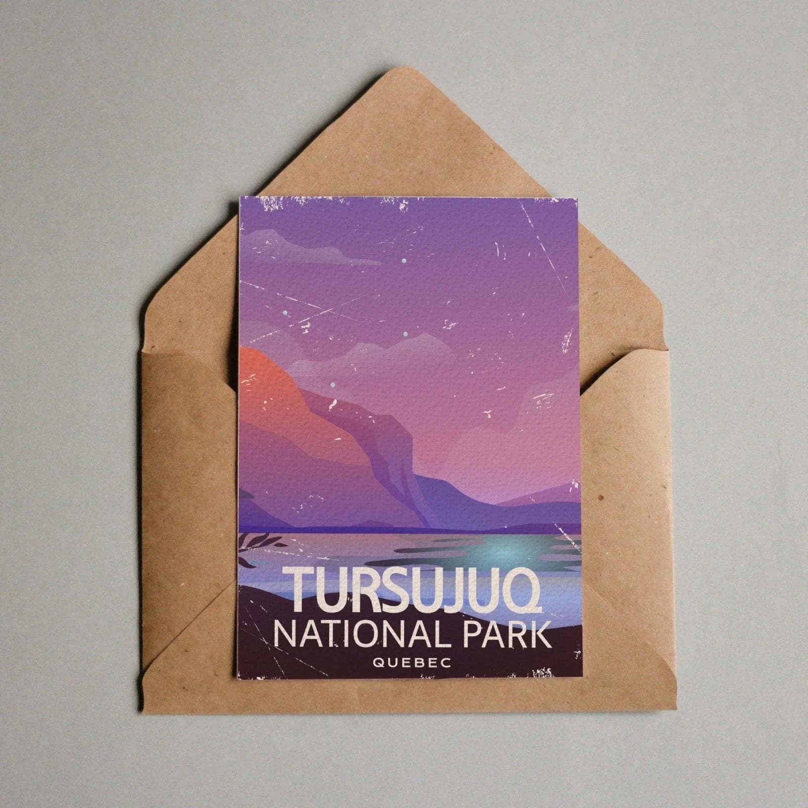 Tursujuq National Park Quebec postcard with purple mountain landscape in brown envelope
