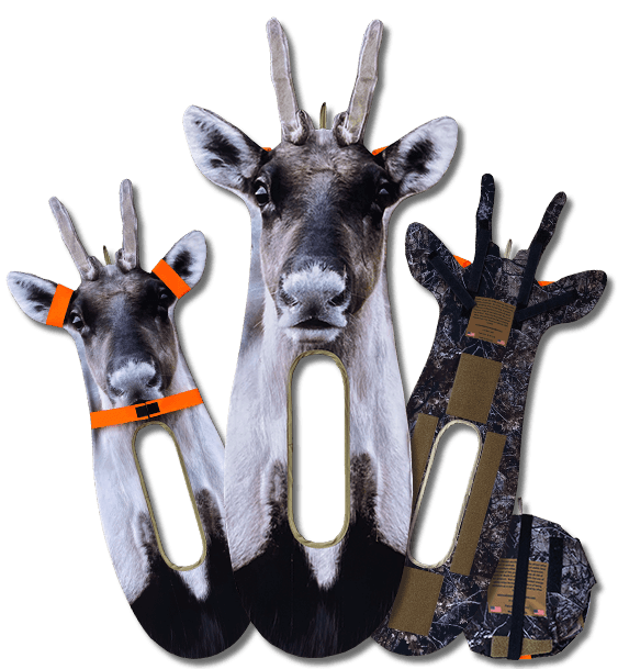 Three caribou hunting decoy sleds with realistic caribou head designs and orange straps