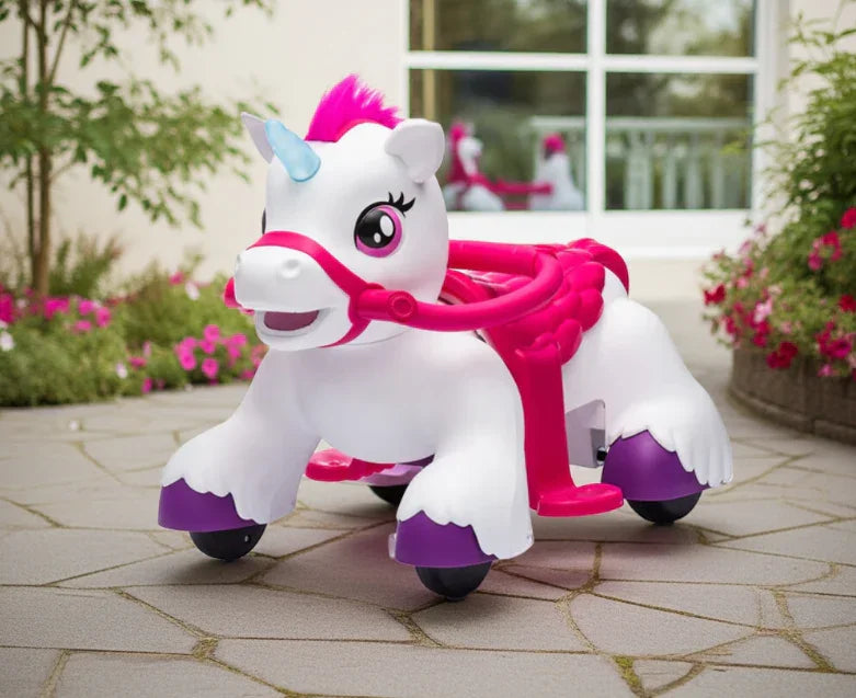 Ride-on unicorn toy with pink accents and purple wheels on a garden patio