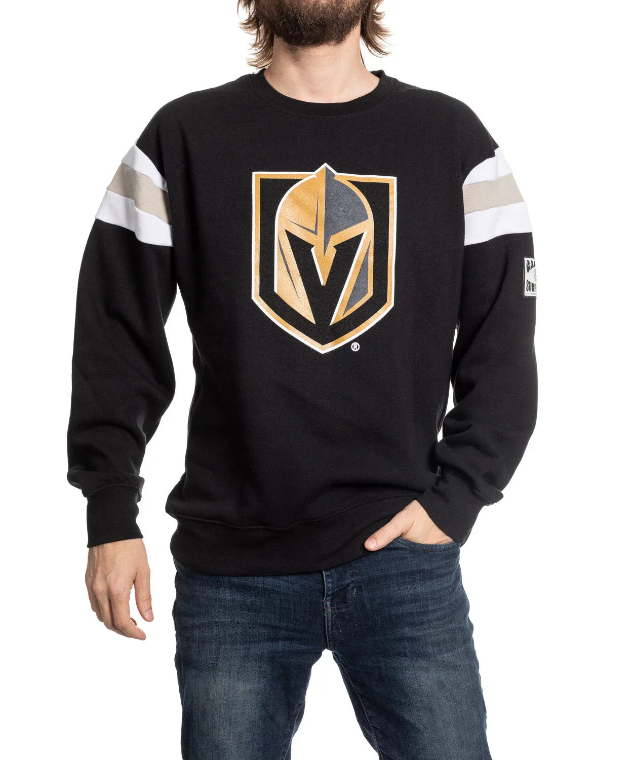 Man wearing black Vegas Golden Knights varsity sweater with logo, white and gold sleeve stripes