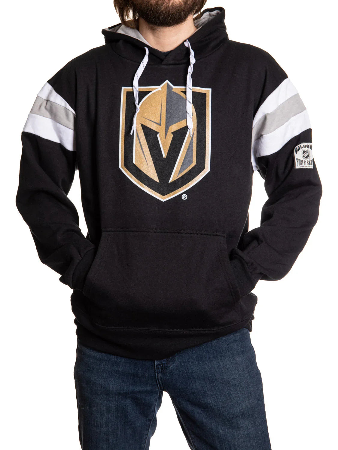 Man wearing black Vegas Golden Knights varsity hoodie with team logo and striped sleeves