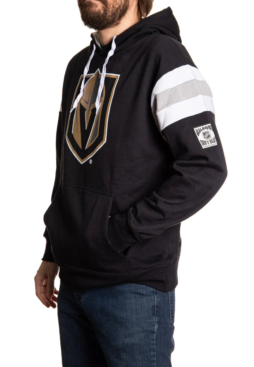 Man wearing Vegas Golden Knights black varsity hoodie with logo and striped sleeve detail