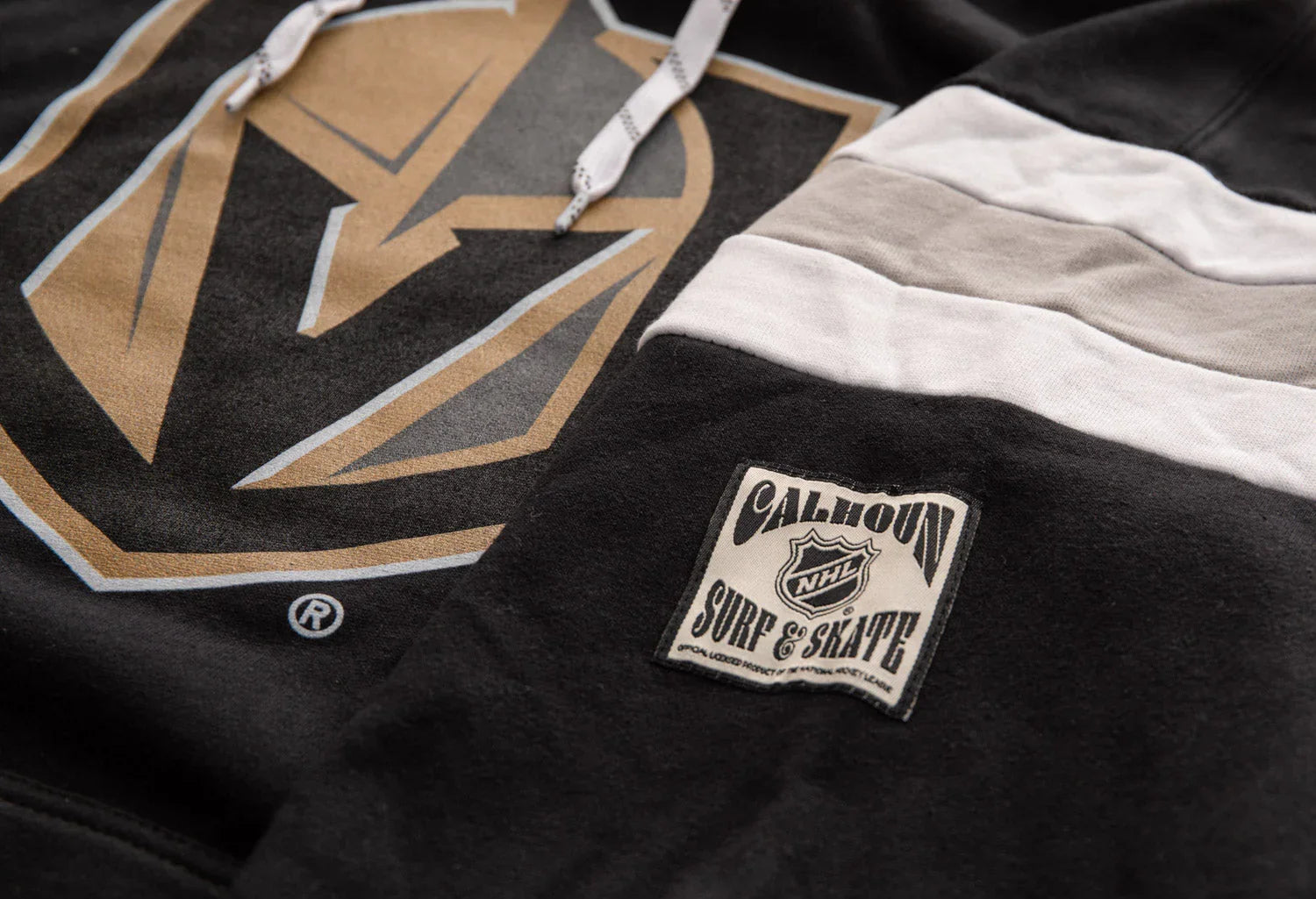 Vegas Golden Knights hoodie with gold logo and Calhoun NHL Surf & Skate patch detail