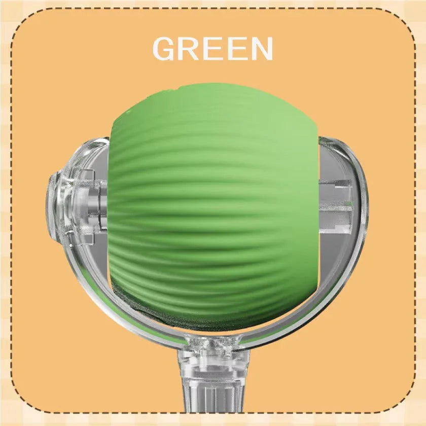 Green textured rubber ball with clear plastic holder on orange background