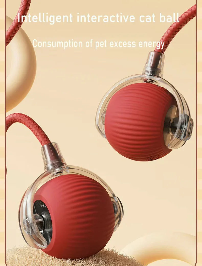 Red interactive cat toy ball with tail on beige background, pet energy activity product