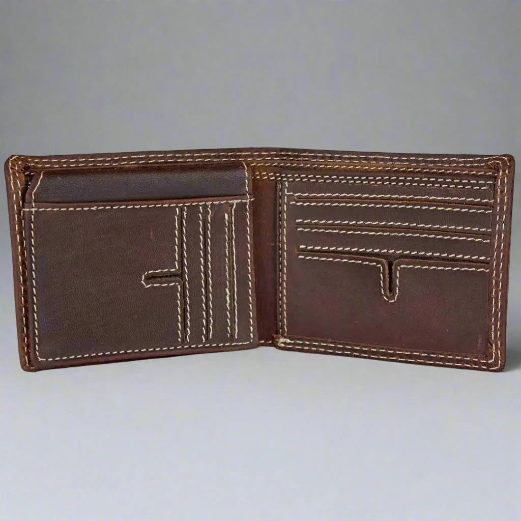 Brown bifold men's leather wallet with contrast stitching and multiple card slots on gray background