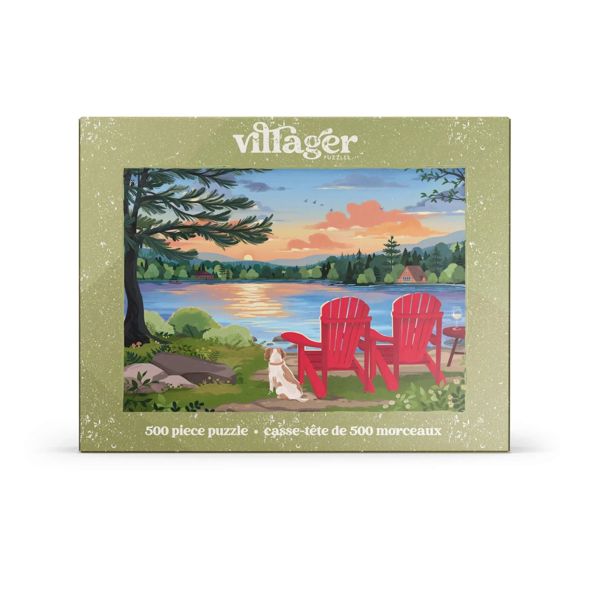 500 piece puzzle box showing lake sunset, two red Adirondack chairs, and dog outdoors