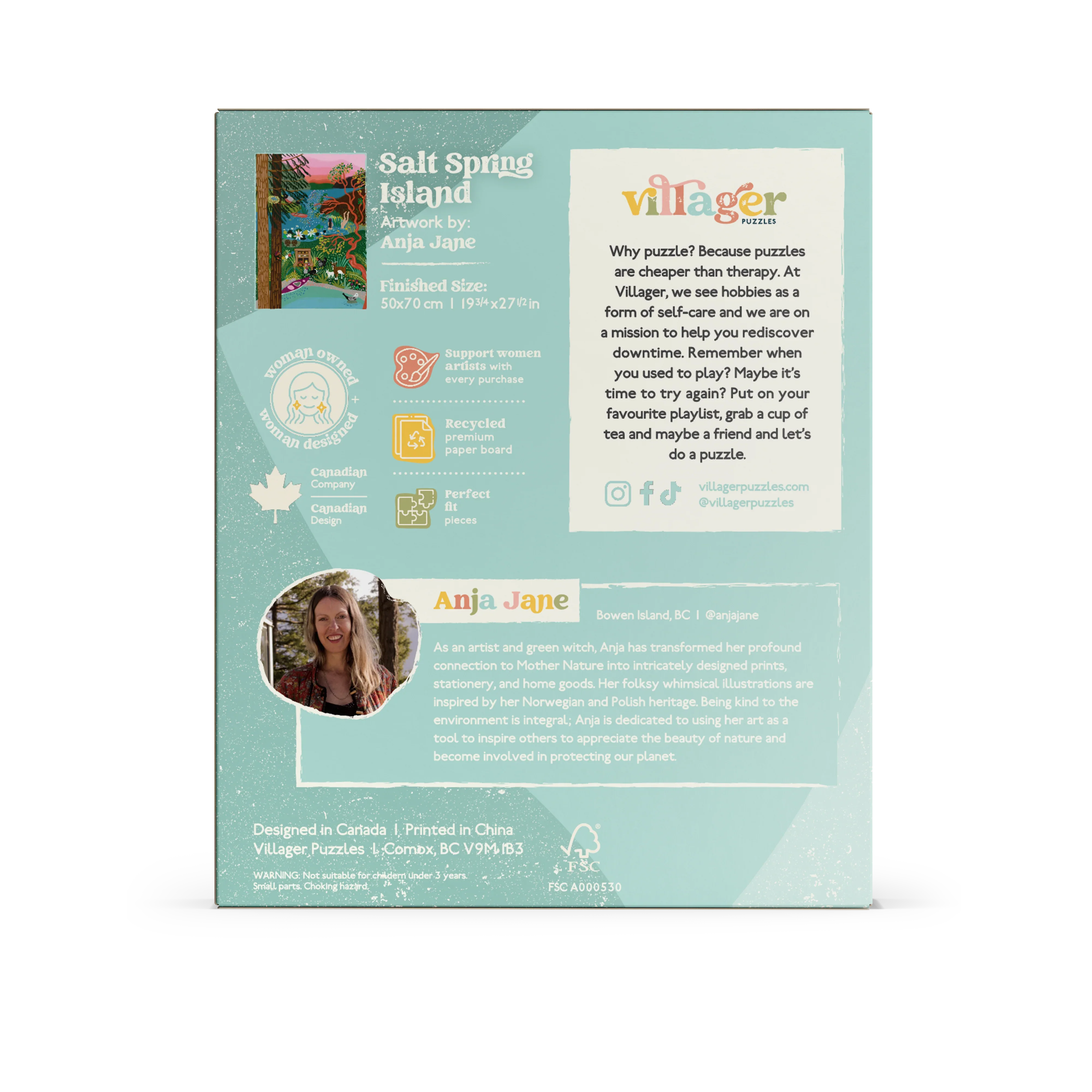 Salt Spring Island puzzle box back showing artist info, eco-friendly icons, and Villager Puzzles branding.