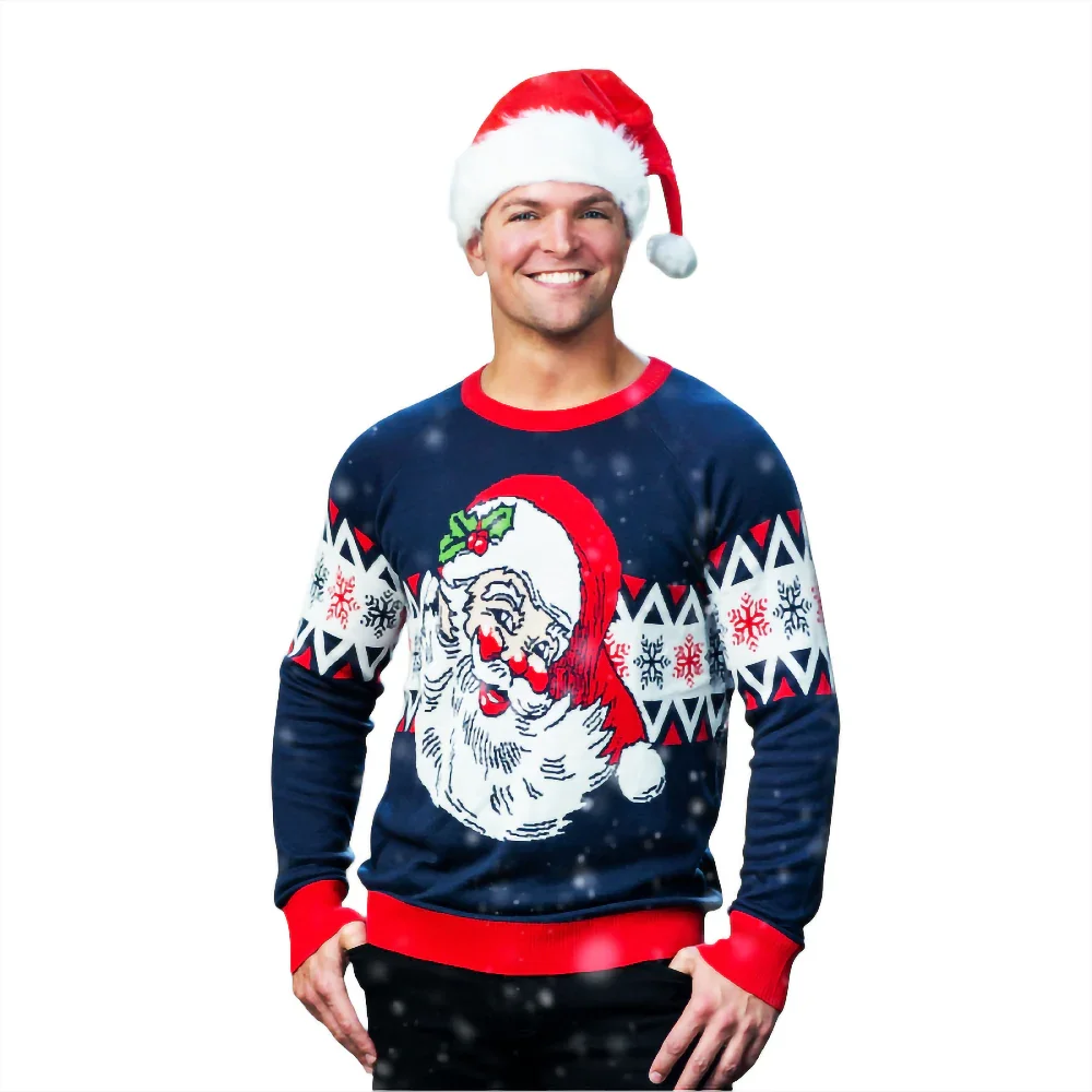 Man wearing Santa hat and Christmas sweater with Santa face, snowflakes, festive background