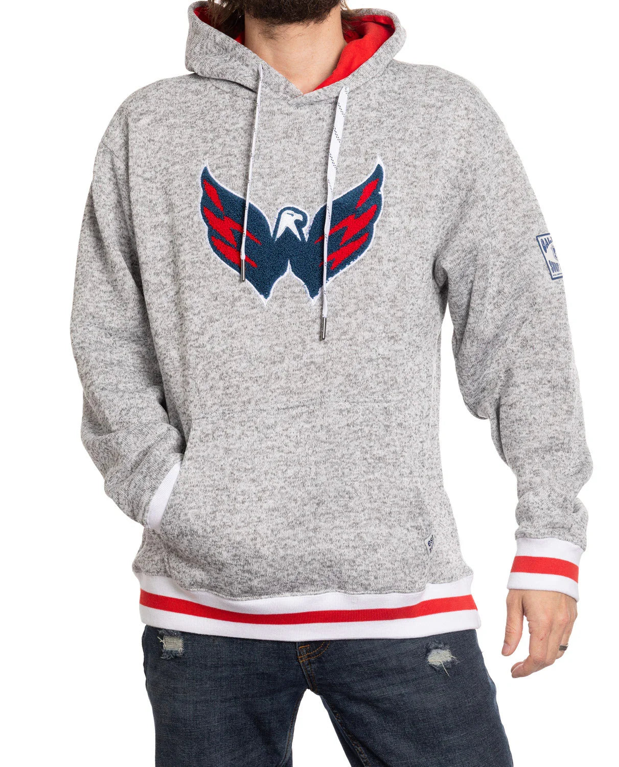 Gray Washington Capitals hooded sweatshirt with team logo, red accents, and casual jeans