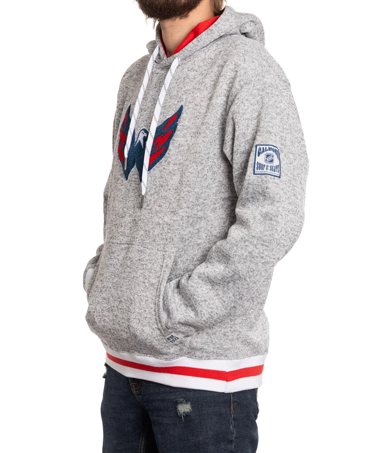 Grey Washington Capitals hoodie with logo, Calhoun patch, red and white trim, worn by man