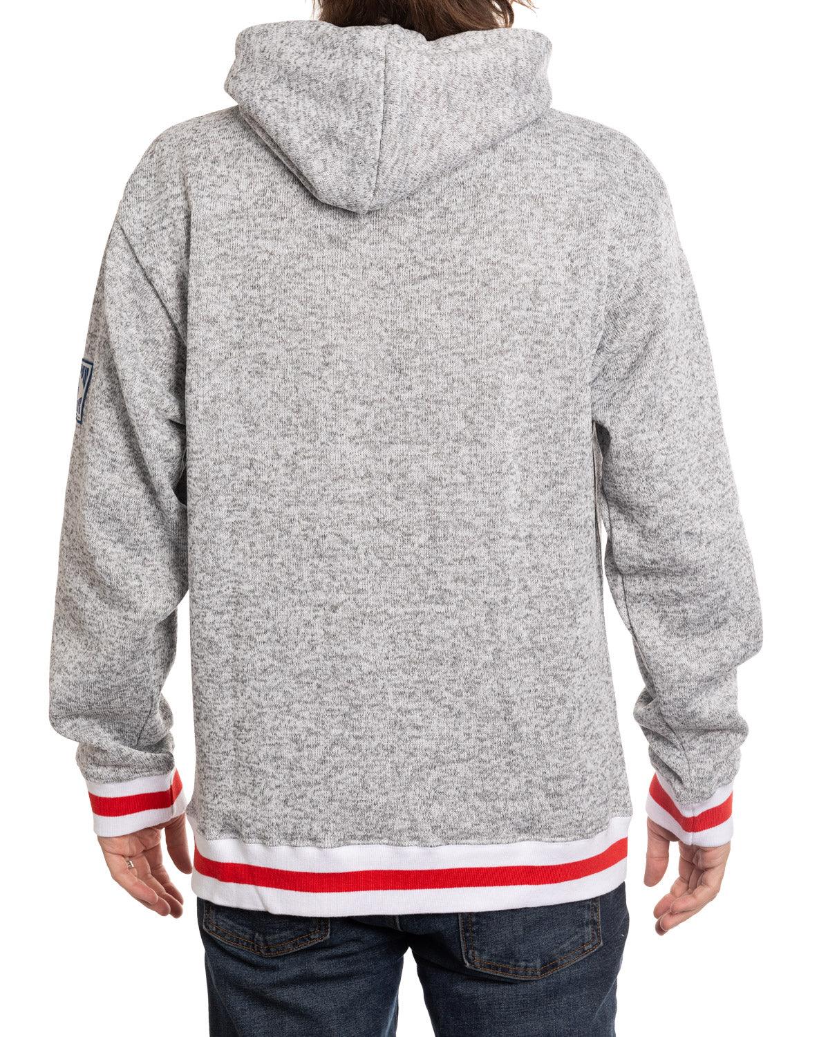 Back view of a gray Capitals Nantucket hoodie with red and white striped cuffs and hem