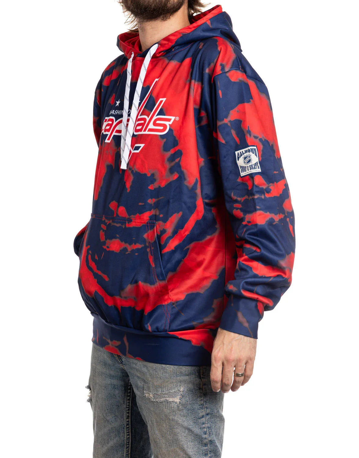 Man wearing Washington Capitals red and blue sublimation hoodie and distressed jeans