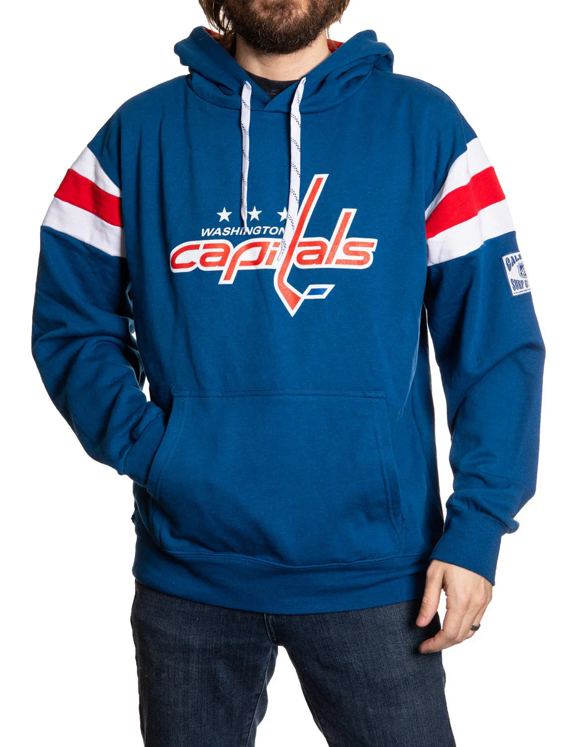 Man wearing blue Washington Capitals varsity hoodie with red and white stripes