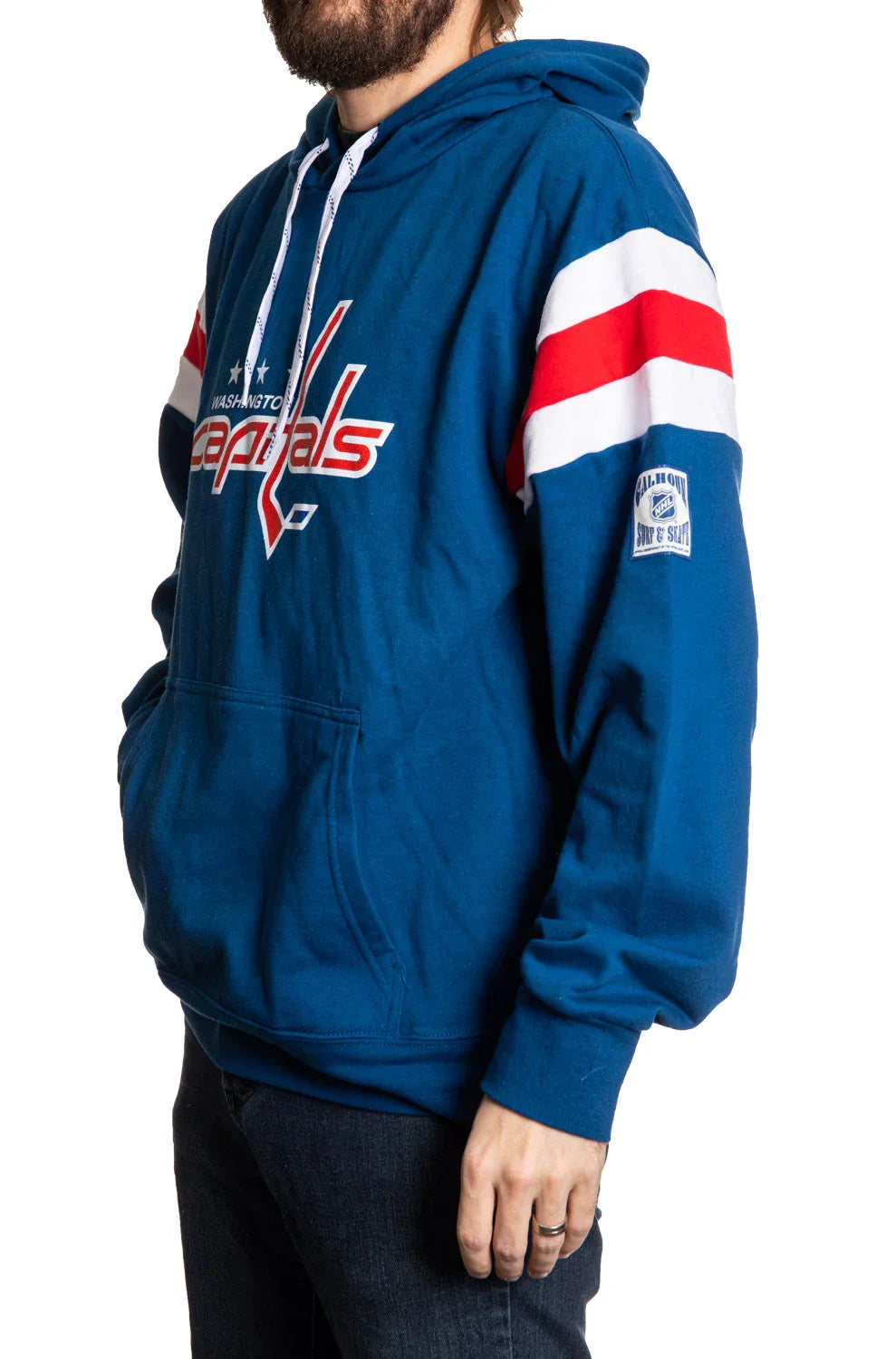 Man wearing blue Washington Capitals varsity hoodie with red and white stripes on sleeves