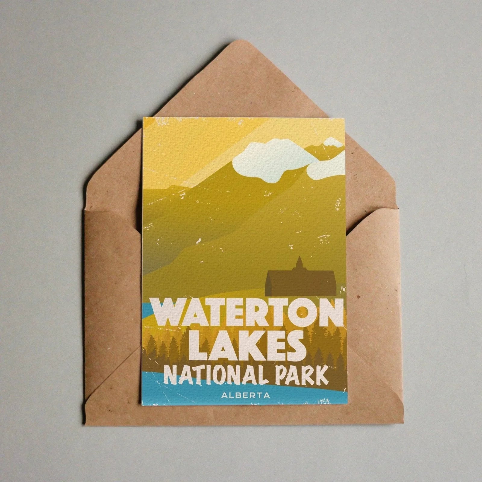 Waterton Lakes National Park Alberta postcard with mountains and clouds in brown envelope