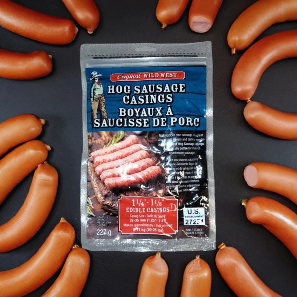 Hog sausage casings package on black table surrounded by smoked sausages