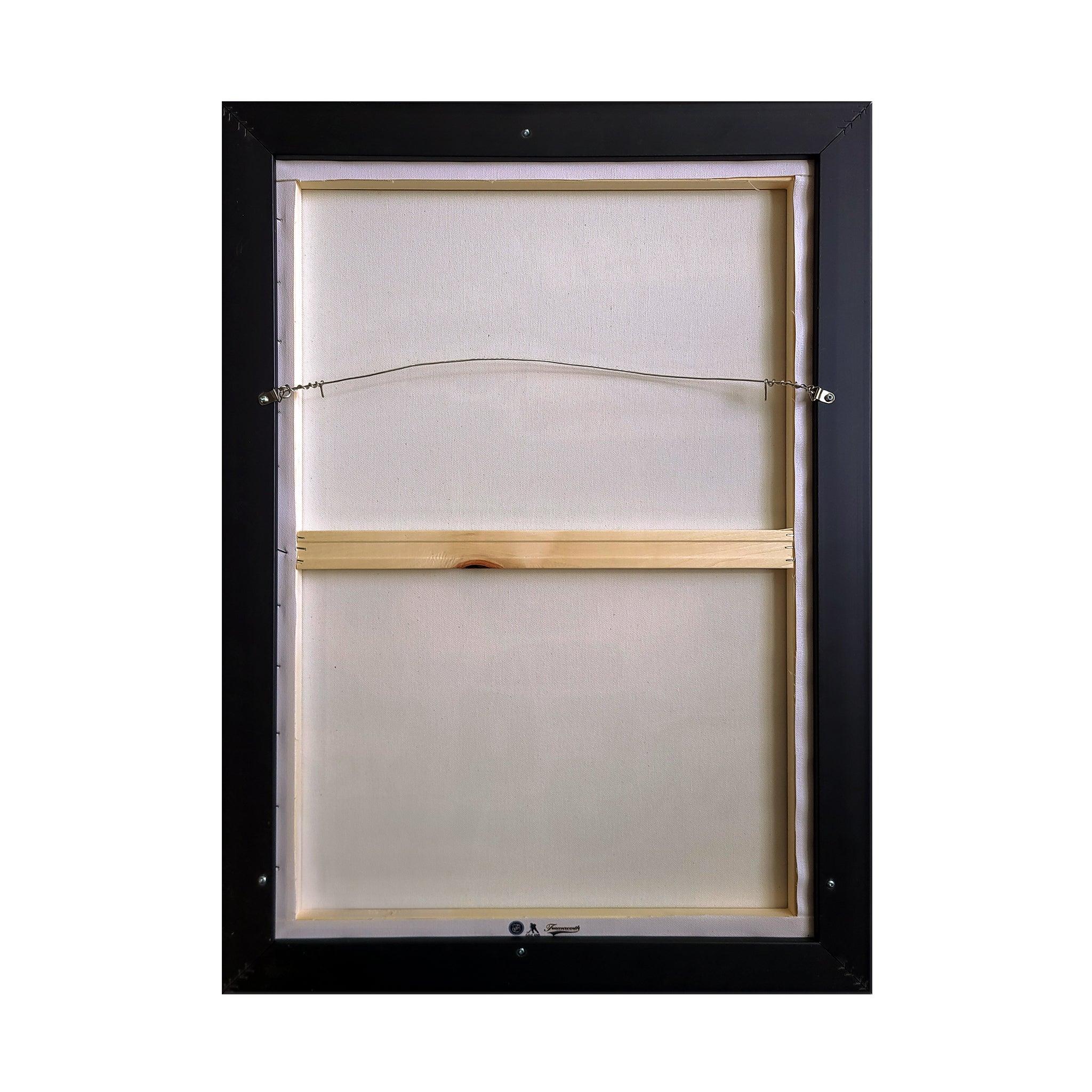 Back of framed canvas wall art with wire hanger and wooden stretcher bar