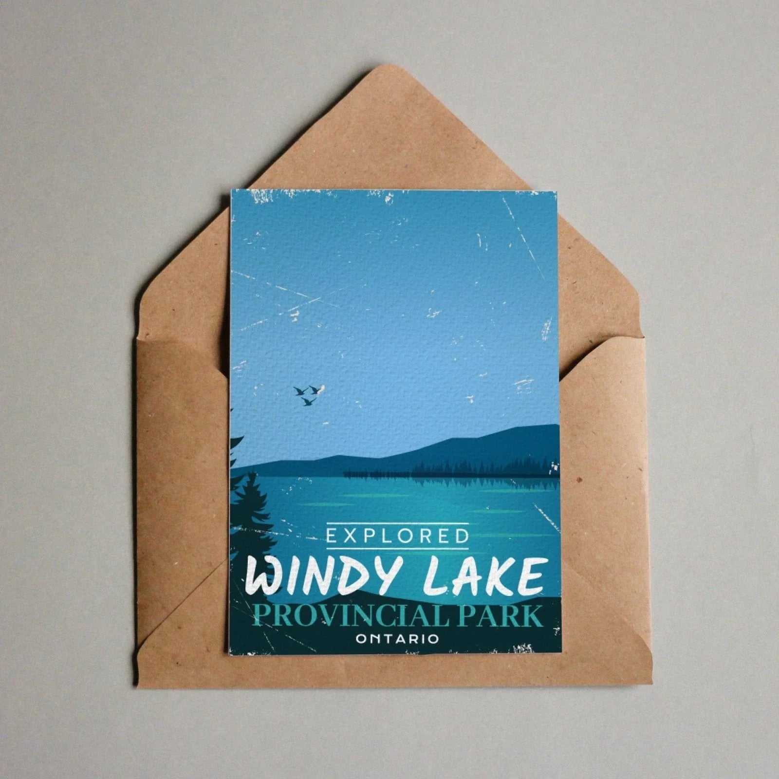 Windy Lake Ontario Provincial Park postcard with lake, hills, and birds in envelope