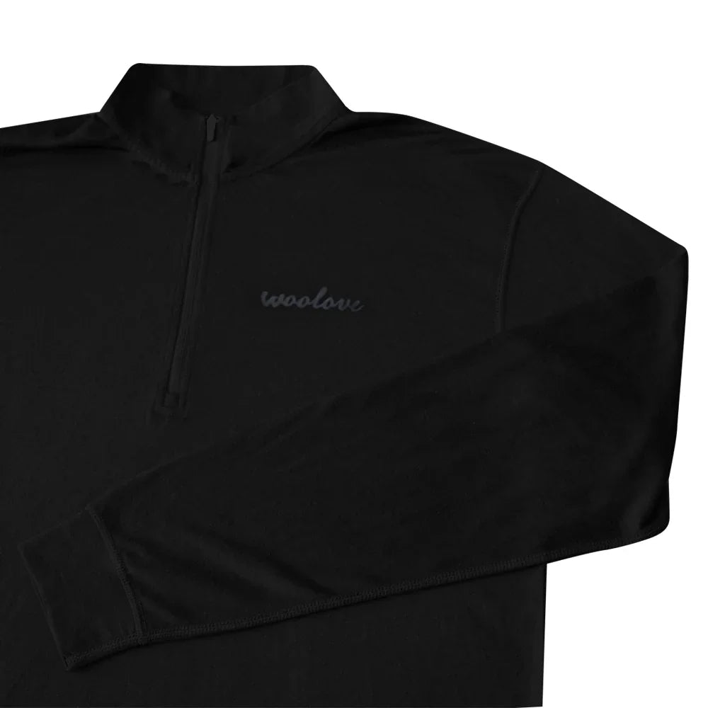 Men's black 100% merino wool quarter-zip baselayer pullover with woolove logo