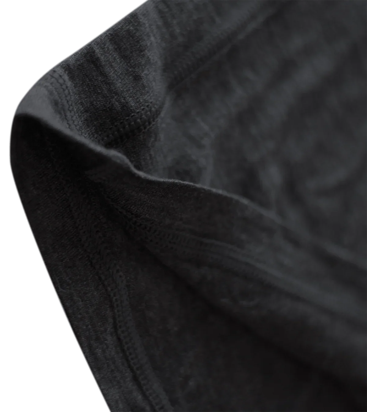 Close-up of black merino wool short sleeve T-shirt fabric and stitching detail