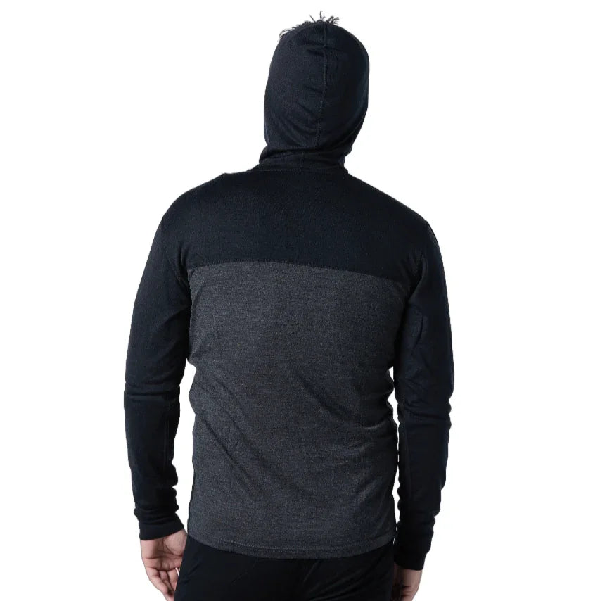 Back view of a man in a two-tone dark gray merino wool quarter zip hoodie