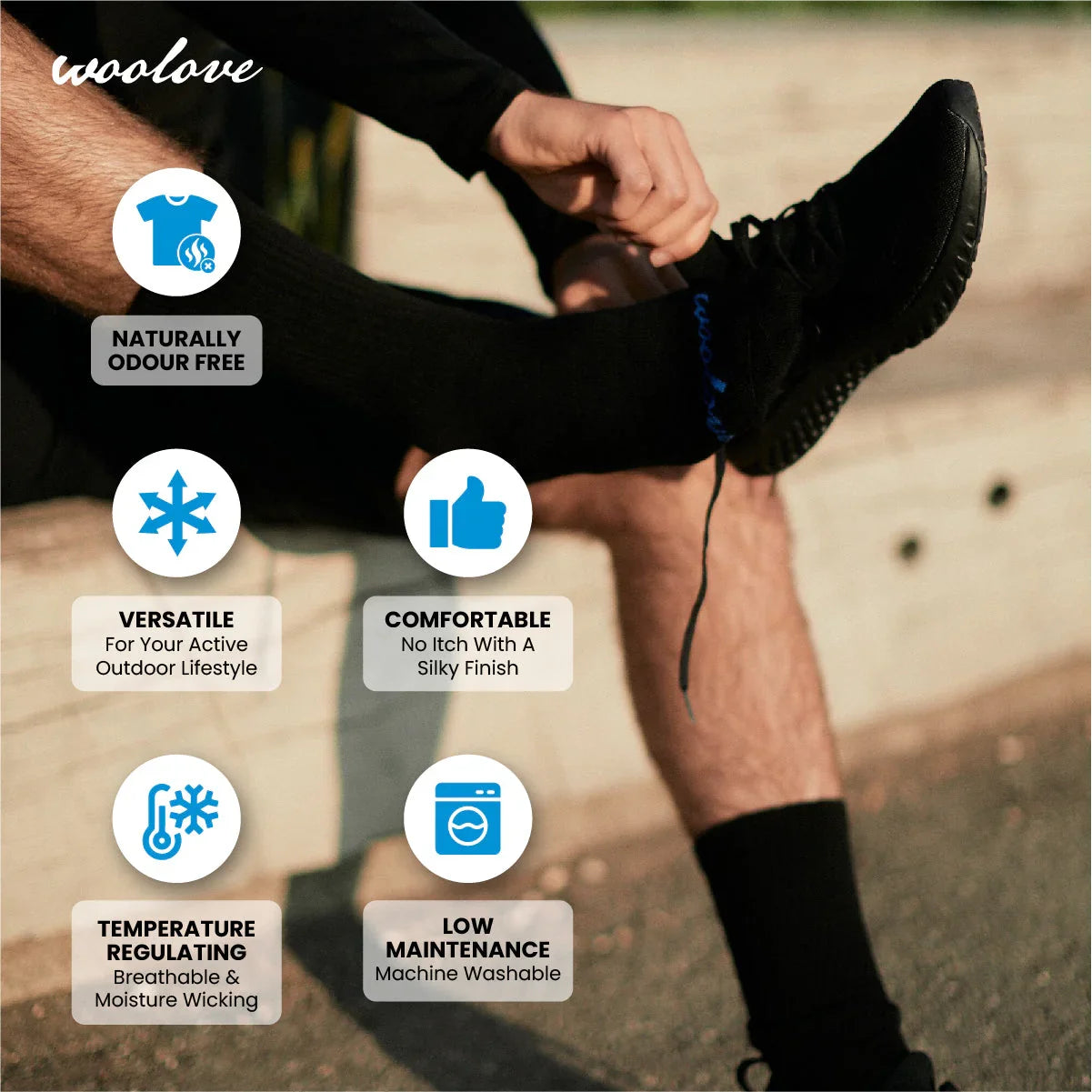 Person putting on black wool socks outdoors, with icons highlighting odor free, comfort, versatility, temperature regulation, and low maintenance benefits.