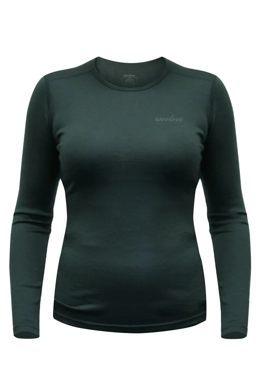 Women's dark green long sleeve merino wool shirt front view on white background