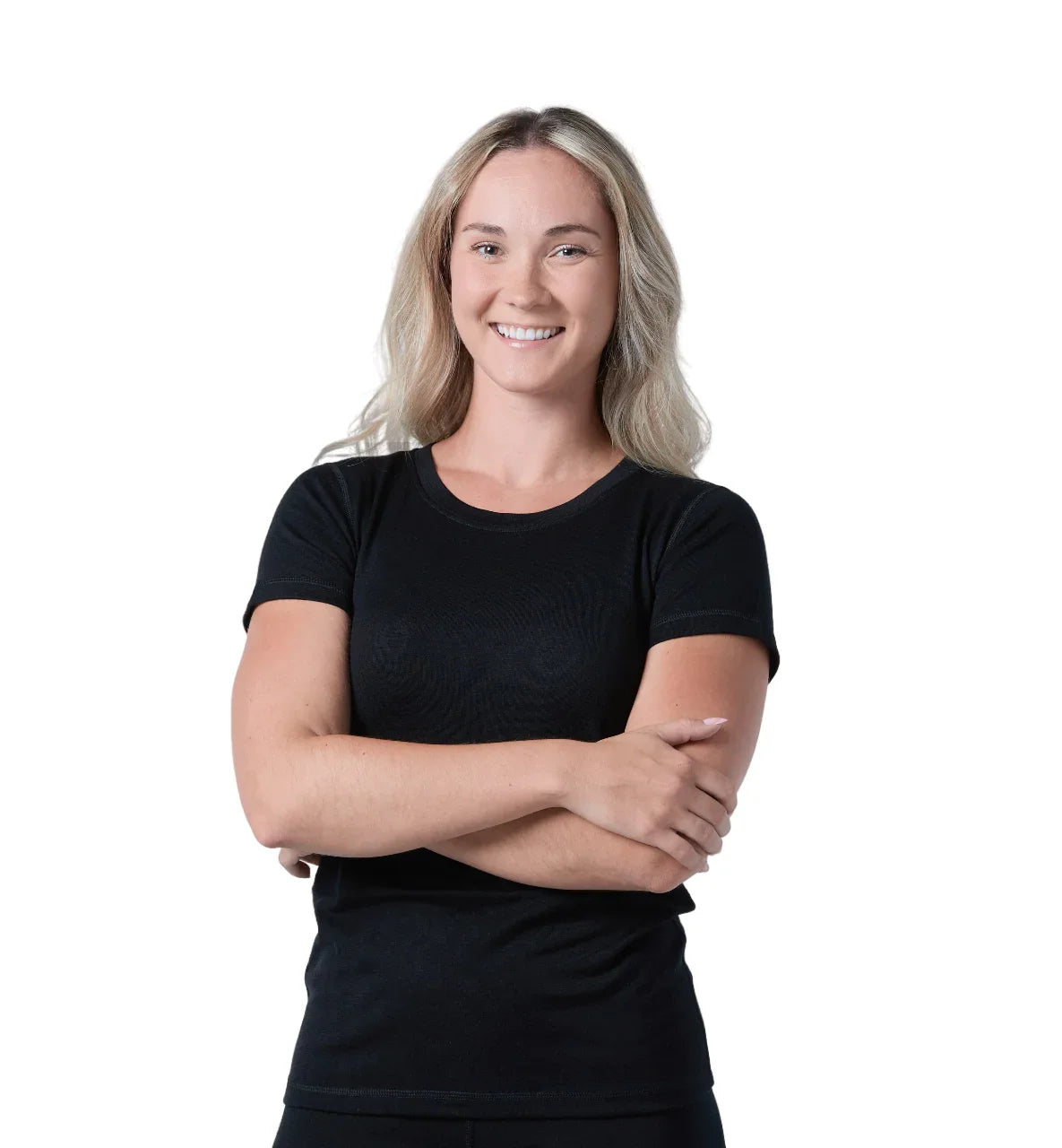 Woman wearing black merino wool t-shirt against white background