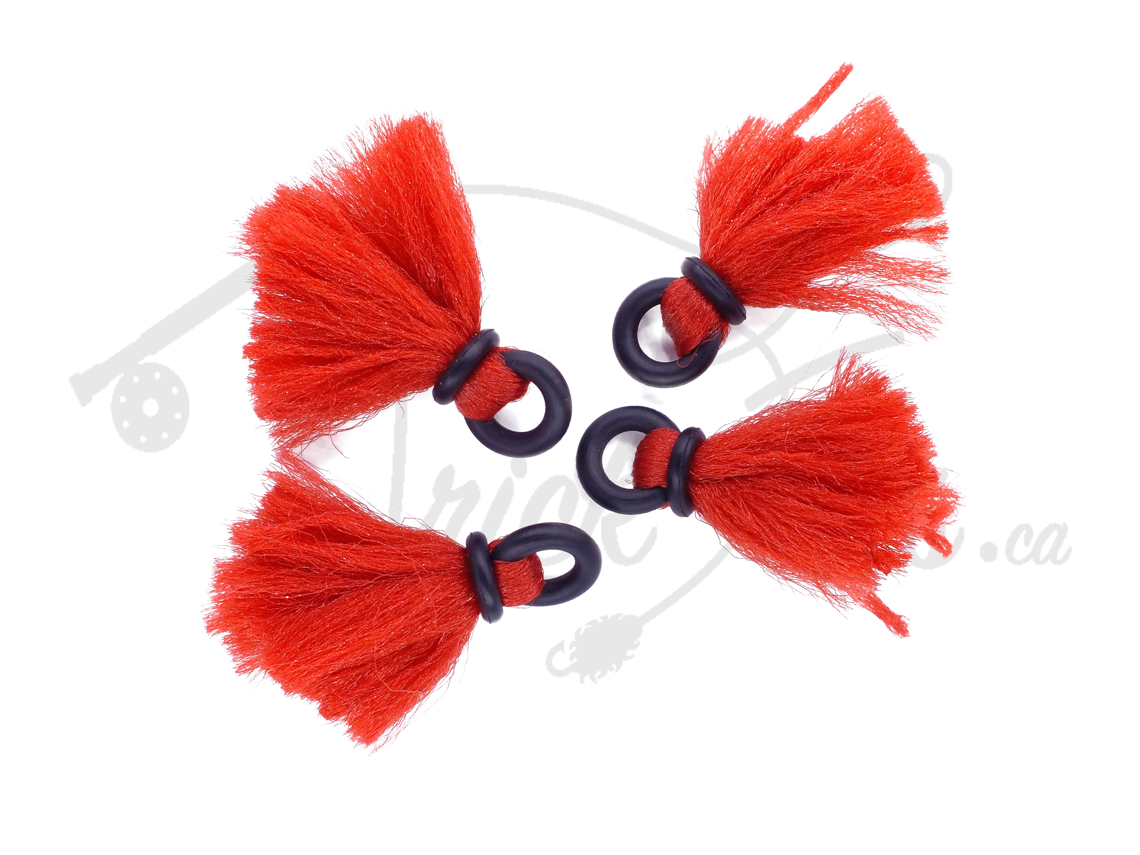 Set of four bright orange yarn strike indicators with black rings for fly fishing