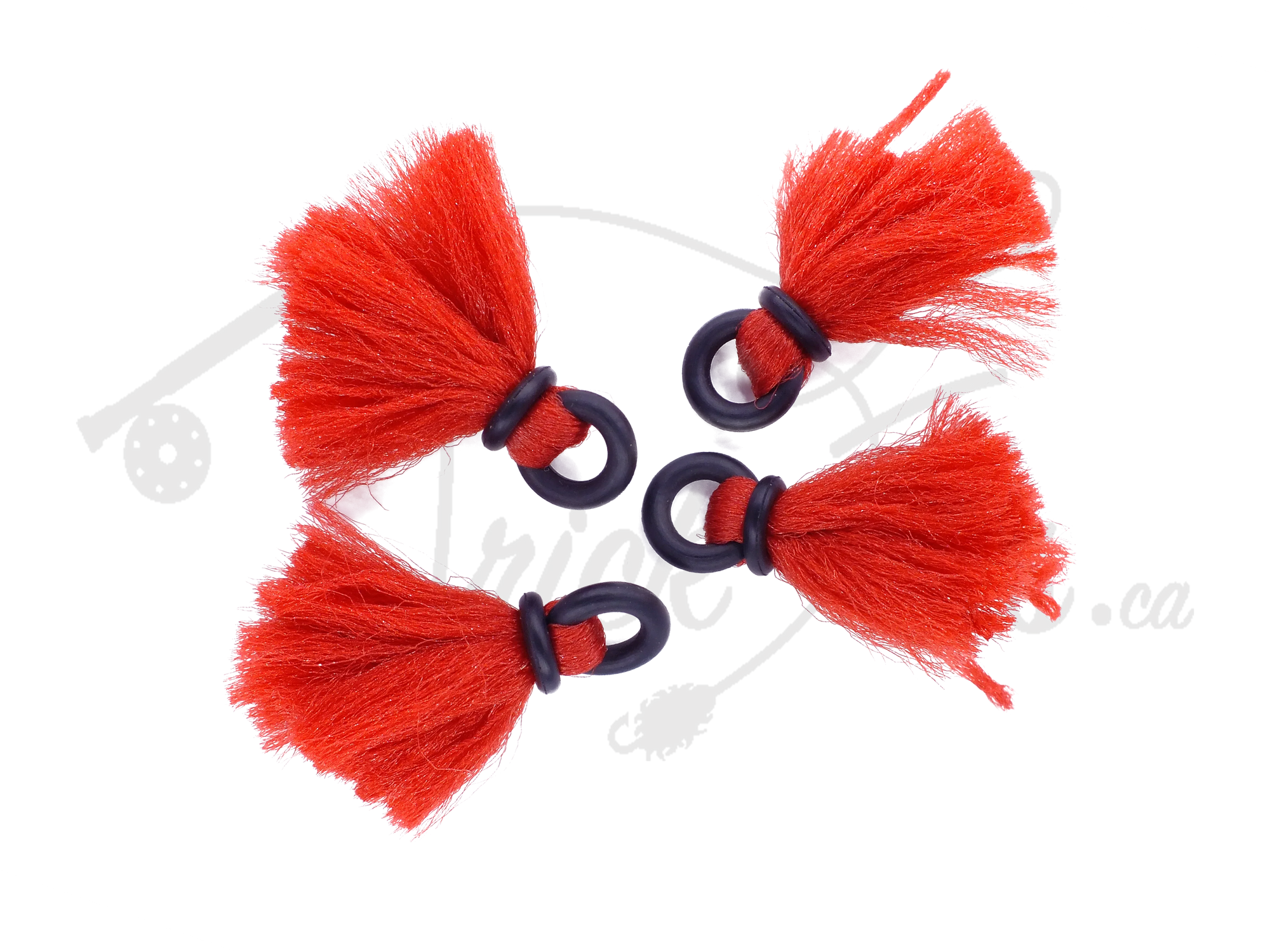 Set of four bright orange yarn strike indicators with black rings for fly fishing