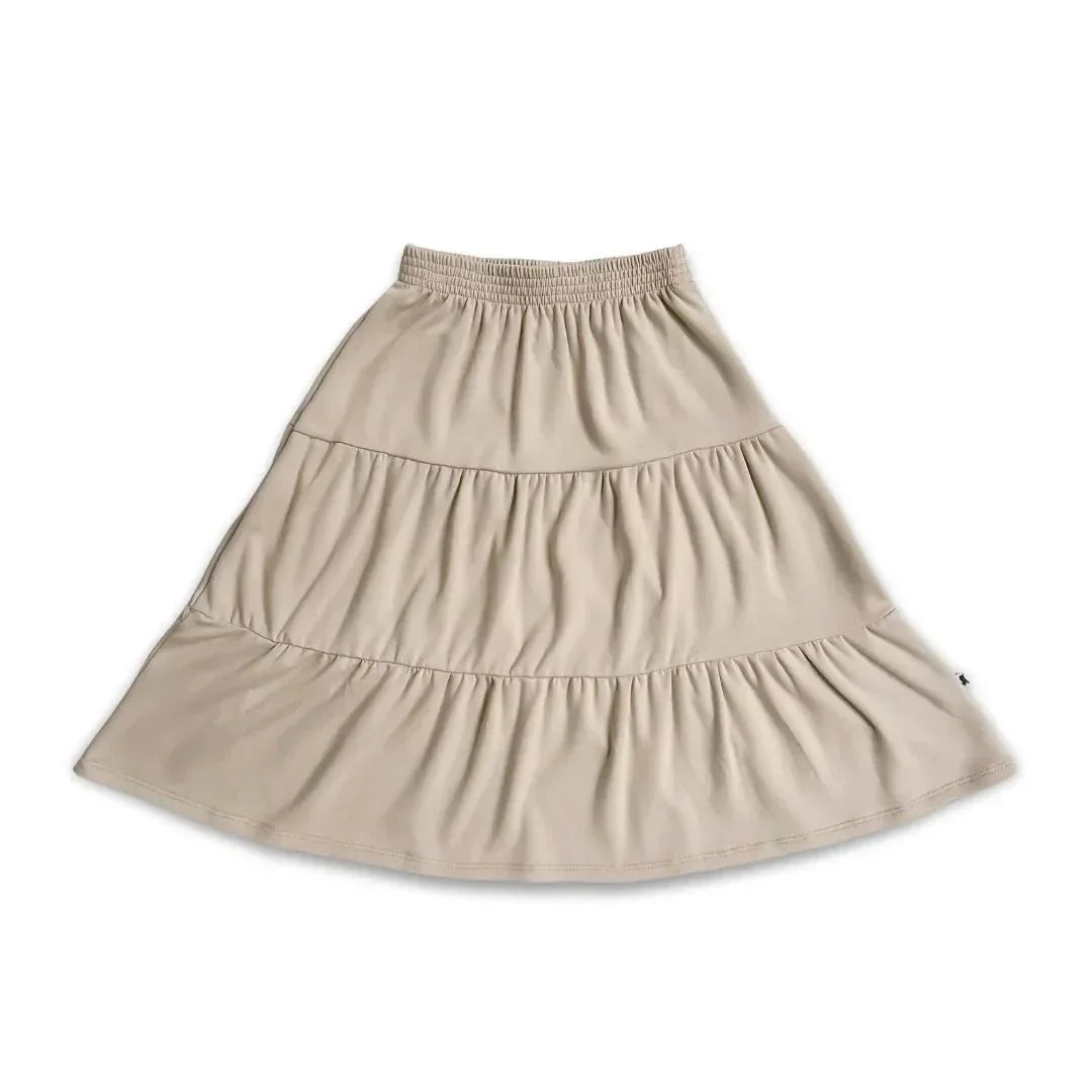 Youth bamboo beige tiered skirt with elastic waistband, displayed on white background