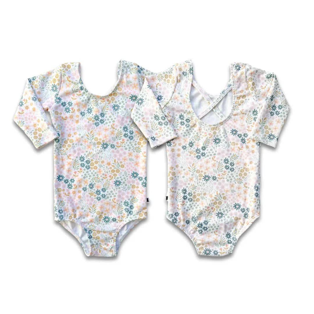 Floral bamboo Audrey bodysuits for youth with long sleeves, shown front and back