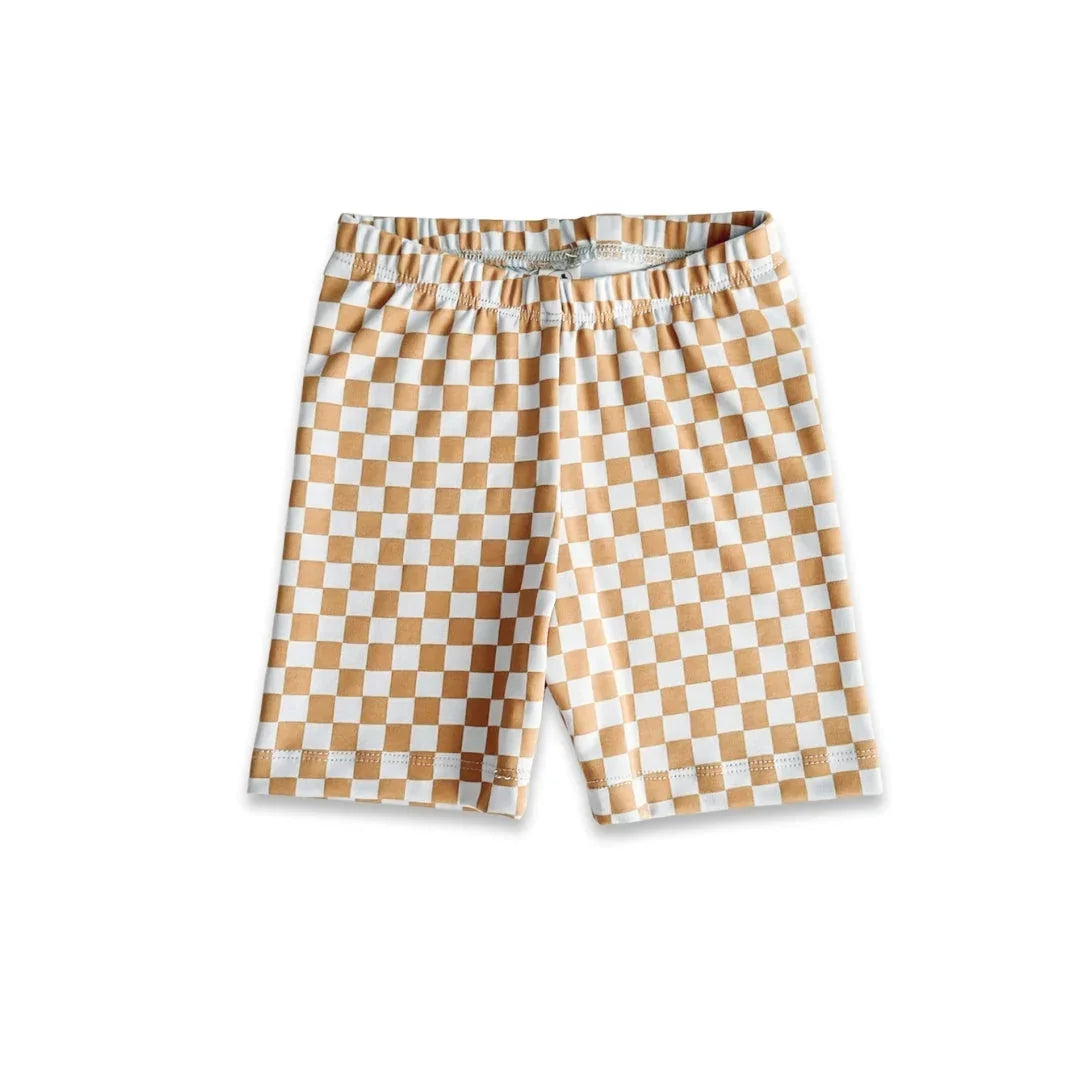 Kids' beige and white checkerboard shorts with elastic waist on white background