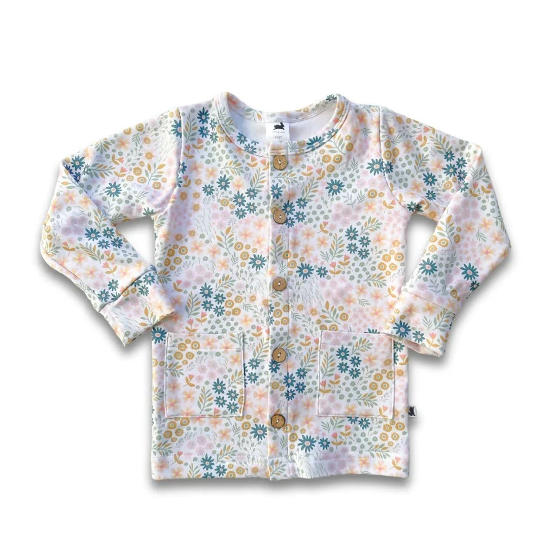 Youth bamboo cardigan with colorful floral print and wooden buttons on white background