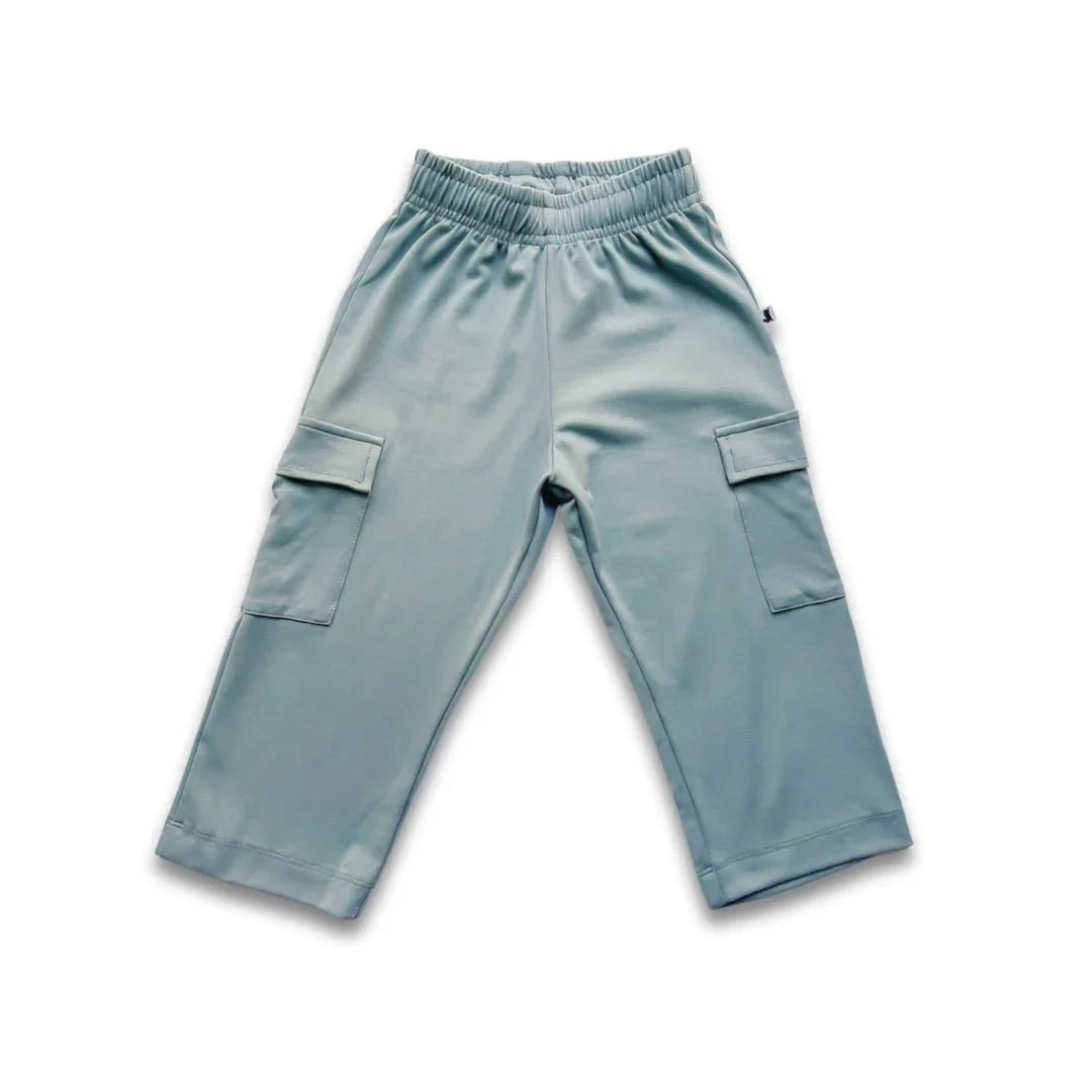 Light blue youth bamboo cargo pants with elastic waistband and side pockets on white background