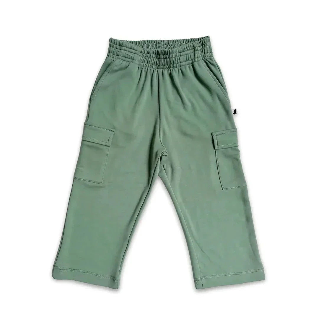 Green bamboo youth cargo pants with elastic waistband and side pockets on white background
