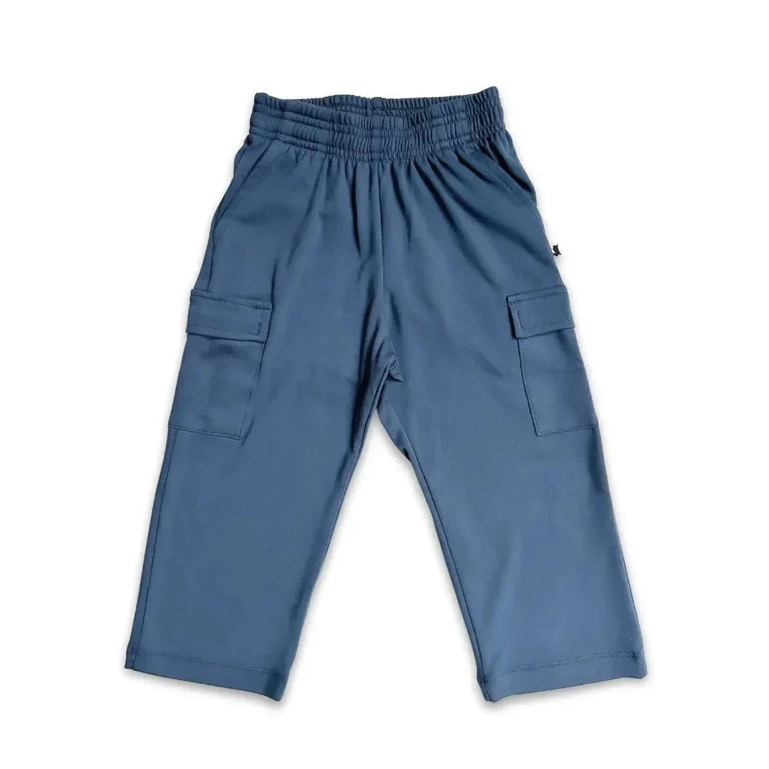 Blue youth bamboo cargo pants with elastic waistband and side pockets on white background