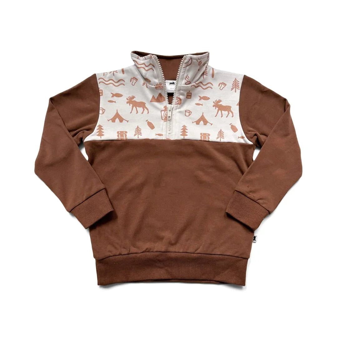 Youth bamboo fleece half zip pullover with brown sleeves and camping-themed print